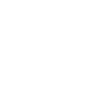 Ein Kosmetiktiegel neben natürlichen Rohstoffen